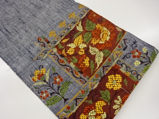 未使用品　手織り真綿紬抽象花唐草模様織出し名古屋帯